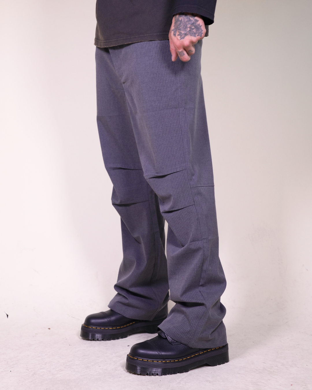 Pantalones con pliegues Puppet Theater en lana a rayas