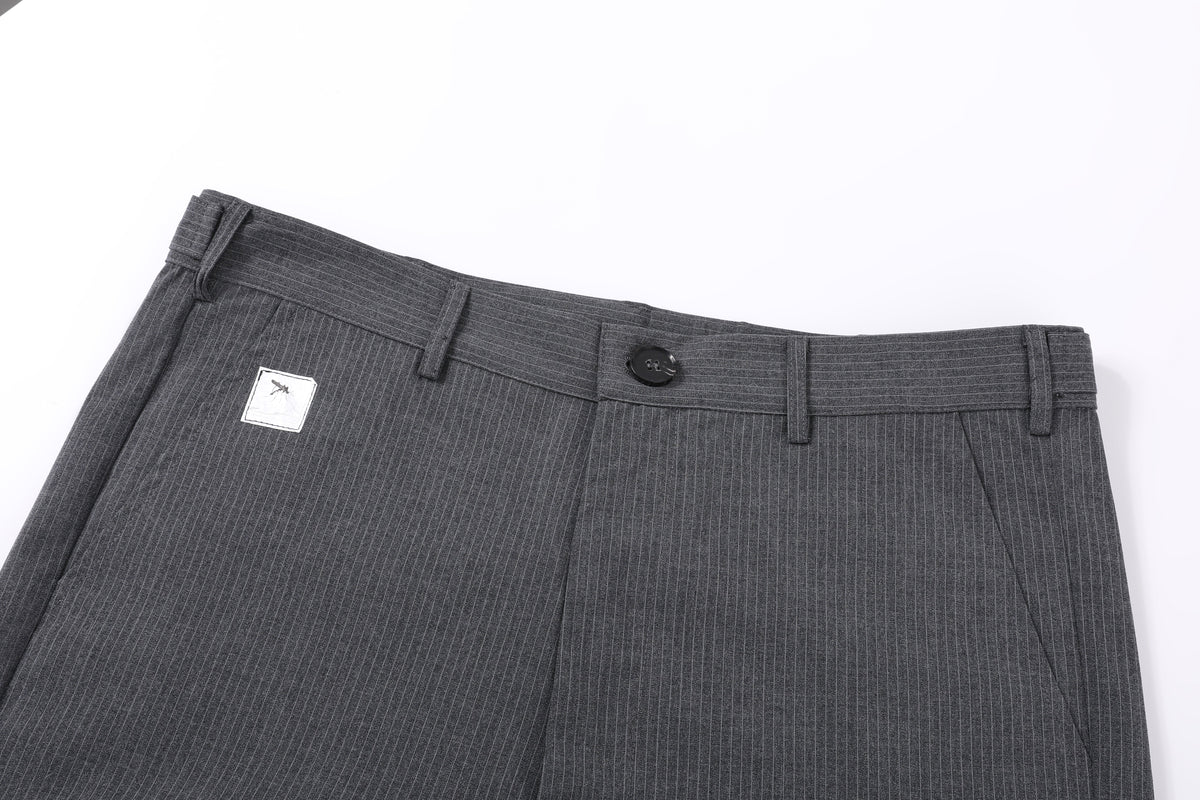 Pantalones con pliegues Puppet Theater en lana a rayas