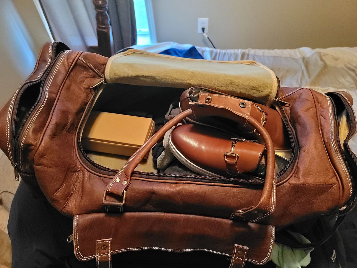 Maleta de viaje tipo weekender de cuero elegante